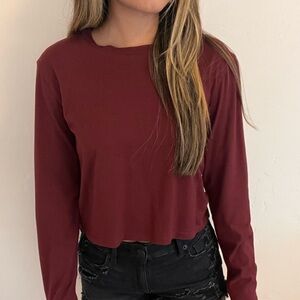 Long sleeve Maroon cropped shirt. Size XS